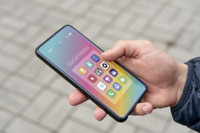 close-up-hand-holding-smartphone