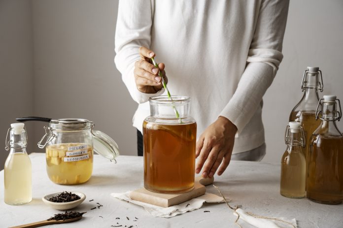 front-view-adult-making-kombucha