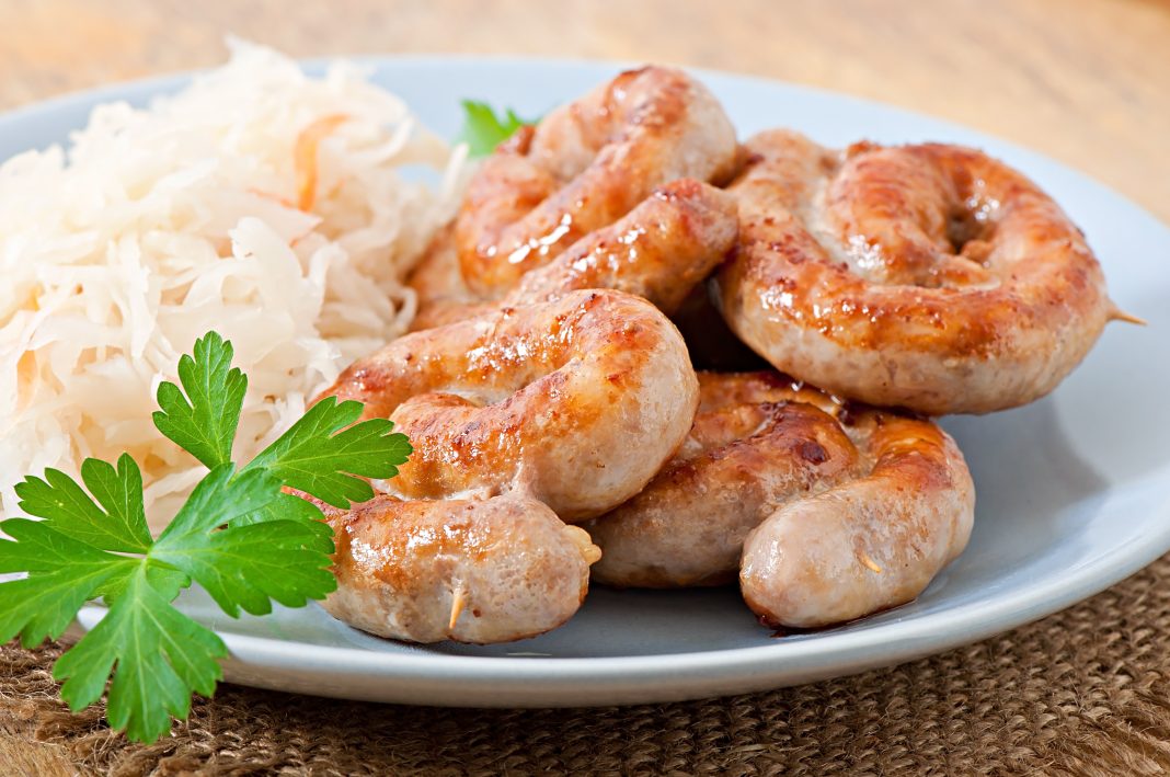 Bavarian fried sausages on sauerkraut